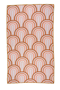 Load image into Gallery viewer, This shows one side of our double sided towels. This side features a rainbow pattern with overlapping rainbows. Each arch is a different pink hue. You can also see the waffle weave pattern of our towels.