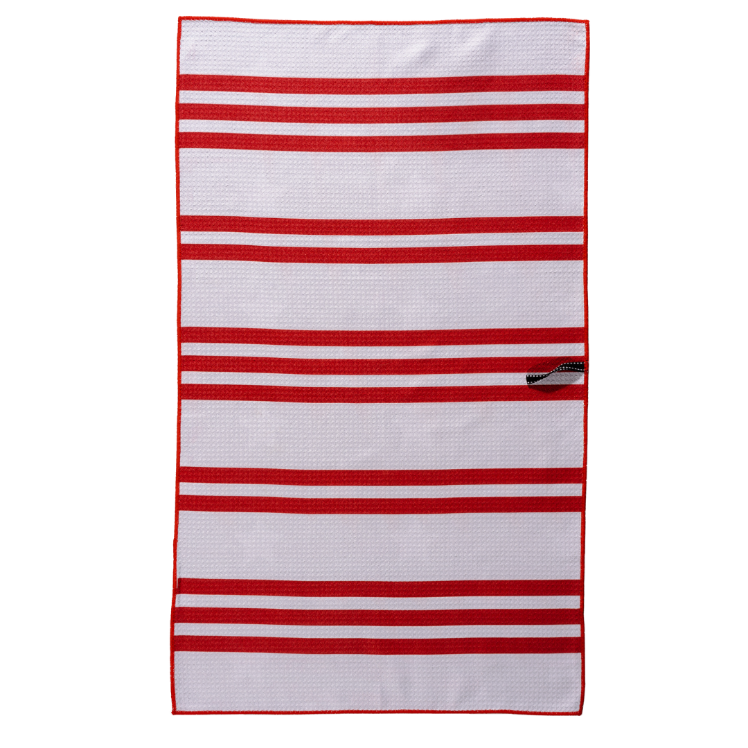 This side of the double sided towel is a white towel with red stripes and red thread around the outside.  