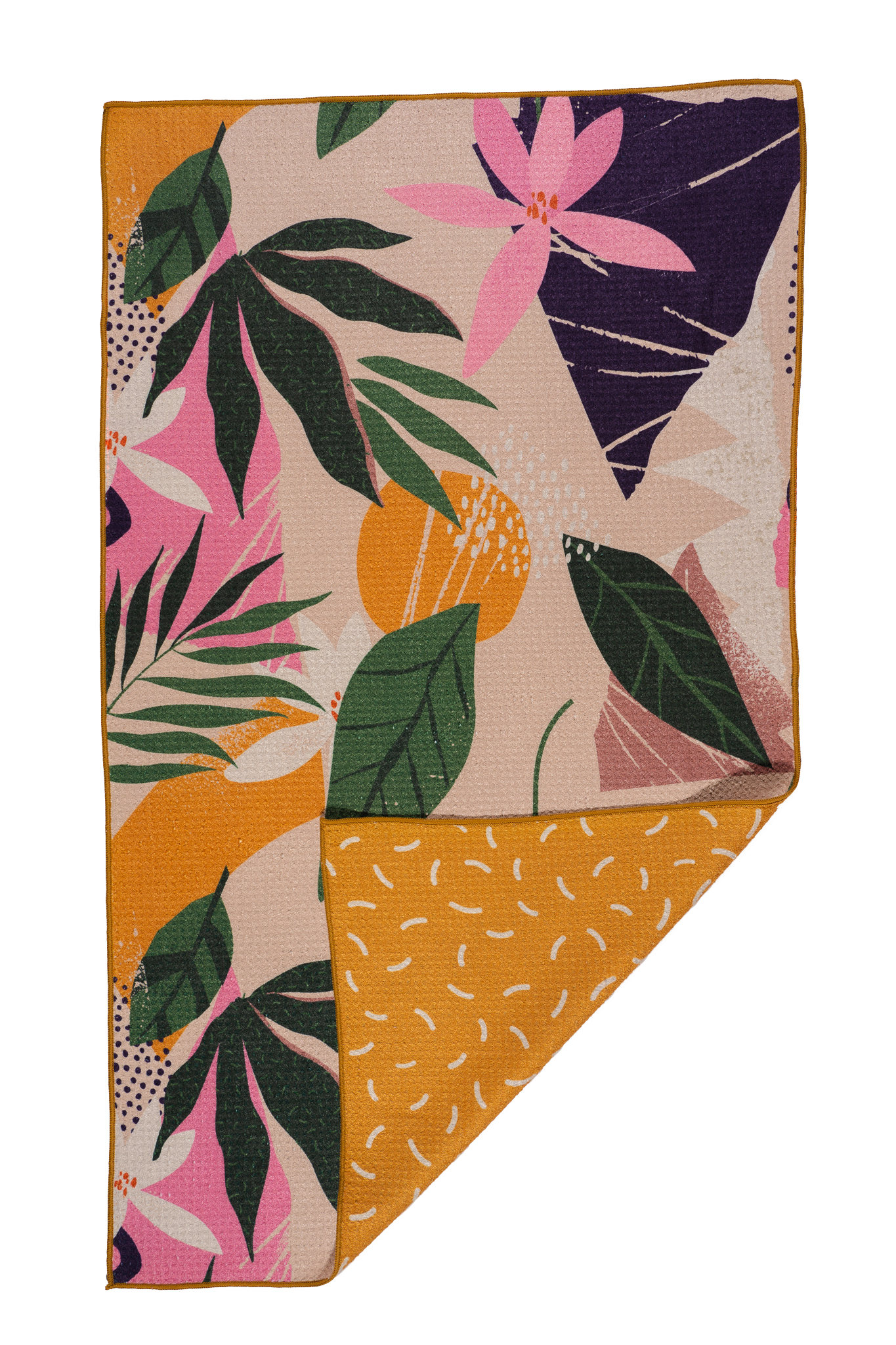 This bamboo towel has fun tropical leaves and flowers on one side with pink, purple, green yellow and white in the pattern.  One of the corners is folded to show the other side of the towel which is a matching yellow with beige looking sprinkles on the other side.